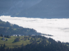 A fjord of clouds running in through the valley