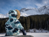 Small girl taking a break from rolling in the snow, enjoying the view...